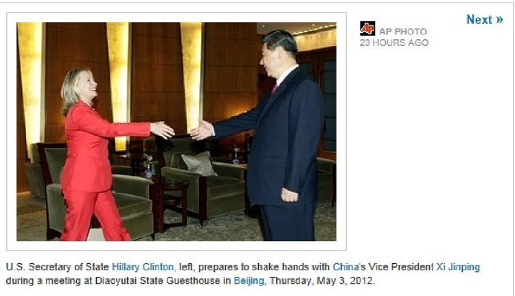 Hillary Clinton shaking hands with China's VP, Xi Jinping